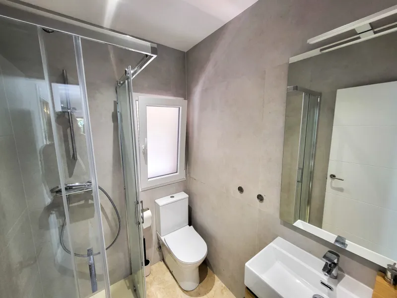 This is an excellent opportunity to own a beautifully renovated two-bedroom, two-bathroom apartment in a sought-after, gated community by the beach.