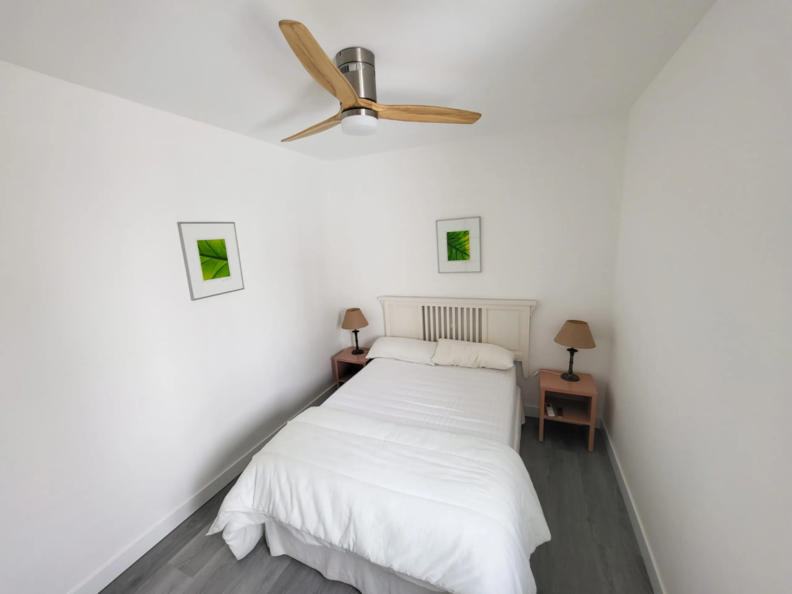 This is an excellent opportunity to own a beautifully renovated two-bedroom, two-bathroom apartment in a sought-after, gated community by the beach.