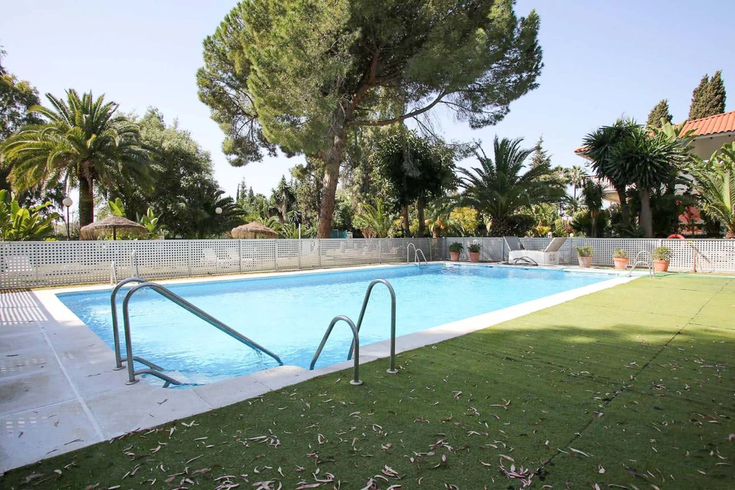 This is an excellent opportunity to own a beautifully renovated two-bedroom, two-bathroom apartment in a sought-after, gated community by the beach.