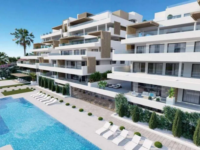 Modern three-bedroom apartment with exceptional terrace, gym, and pool area.