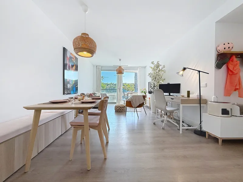 This beautiful three-bedroom, two-bathroom apartment benefits from a southwest orientation, ensuring lovely afternoon light and pleasant sunsets. From the terrace, you can enjoy open views of the surrounding nature, with a partial sea view to the left. Th