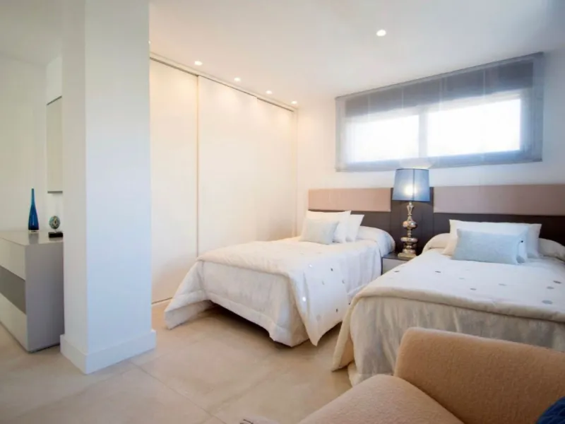 A stunning modern villa set on 1,269 sqm plot in the most sought-after area of Nueva Andalucia. This luxurious property offers five spacious bedrooms and bathrooms, designed with clean lines and contemporary finishes throughout. The villa features a beaut