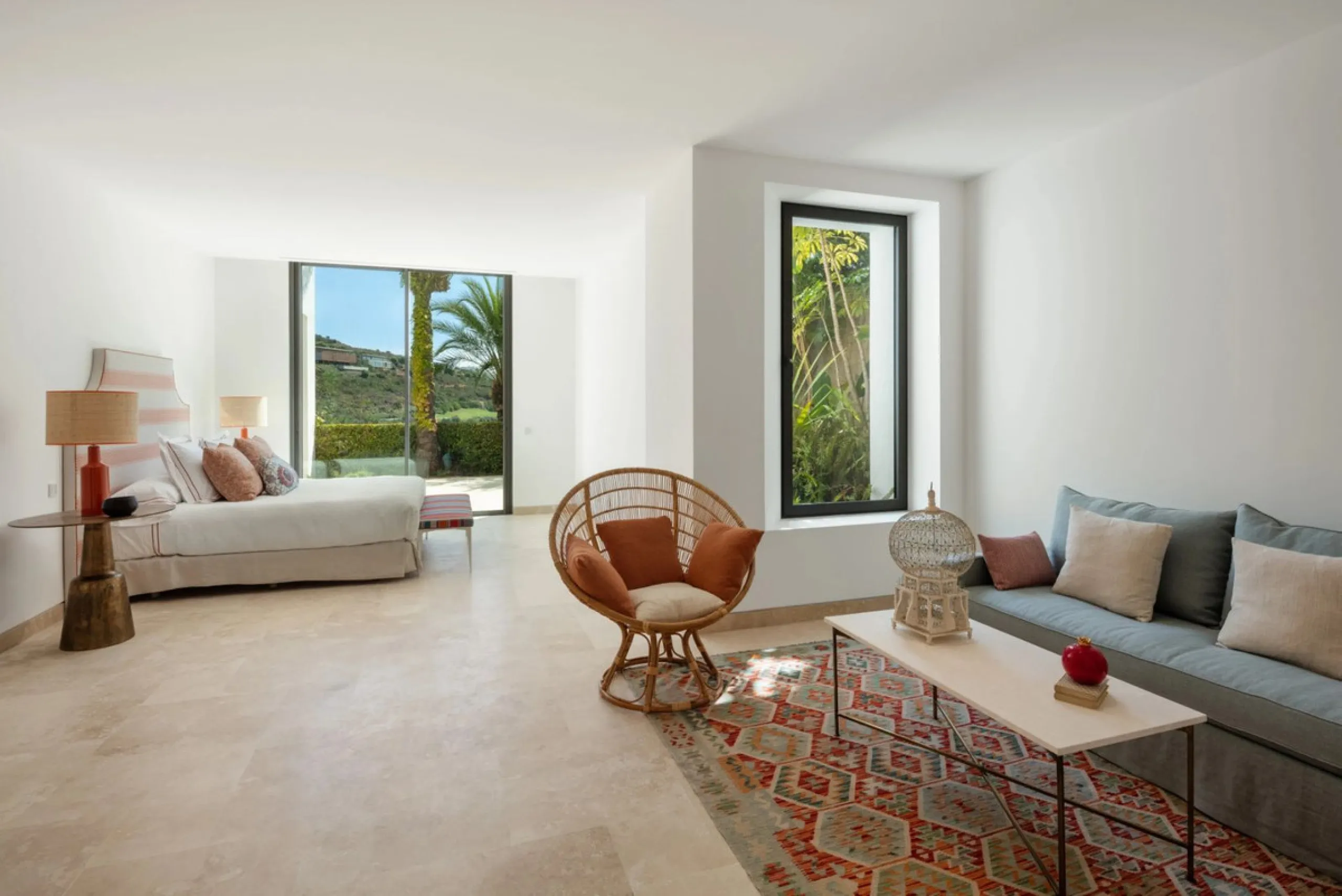 Situated in the exclusive Green 10 enclave within the prestigious Finca Cortesin Resort, this elegant villa offers a modern interpretation of luxury golfside living. Set across two levels, the home features a spacious open-plan living area with soaring ce