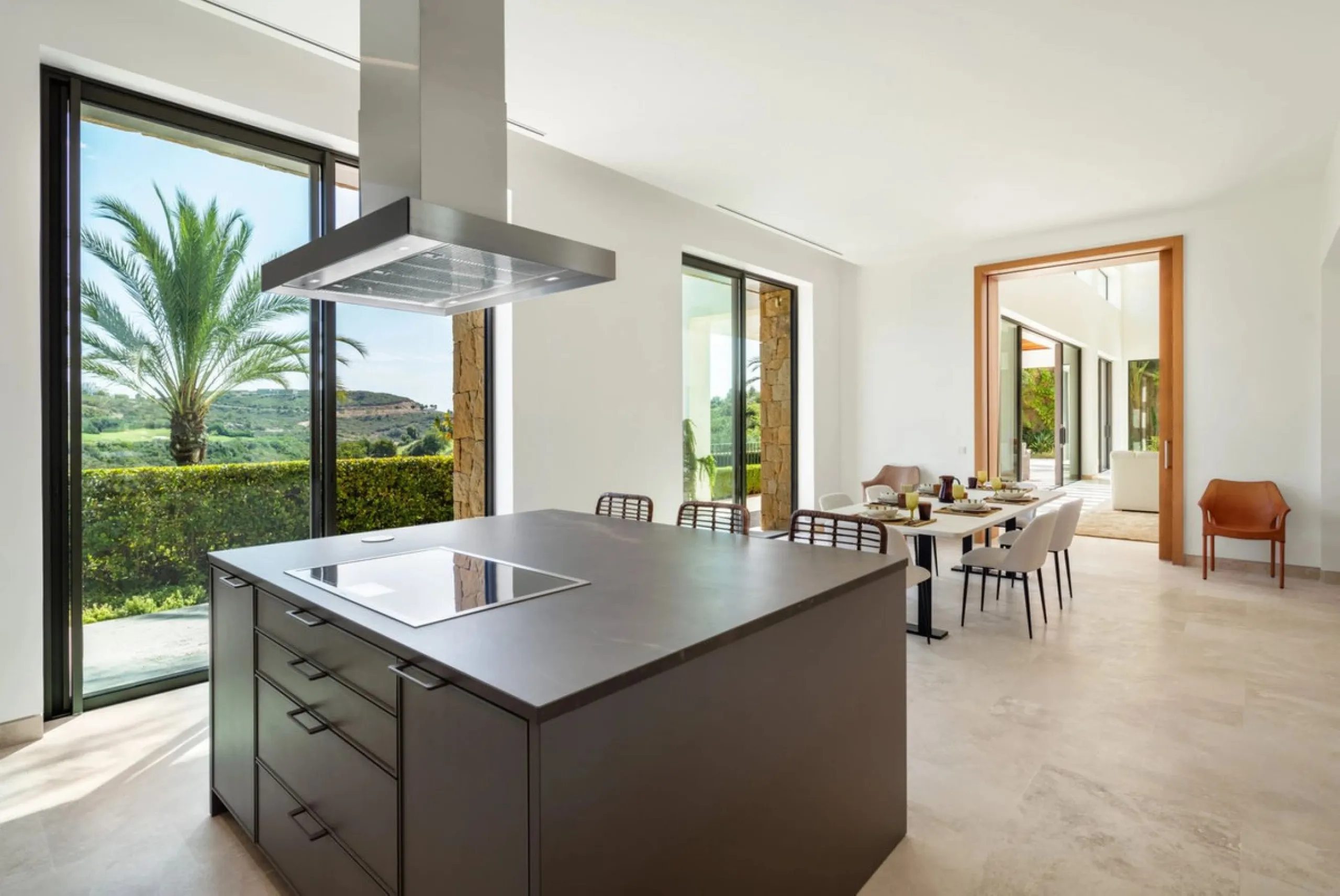 Situated in the exclusive Green 10 enclave within the prestigious Finca Cortesin Resort, this elegant villa offers a modern interpretation of luxury golfside living. Set across two levels, the home features a spacious open-plan living area with soaring ce