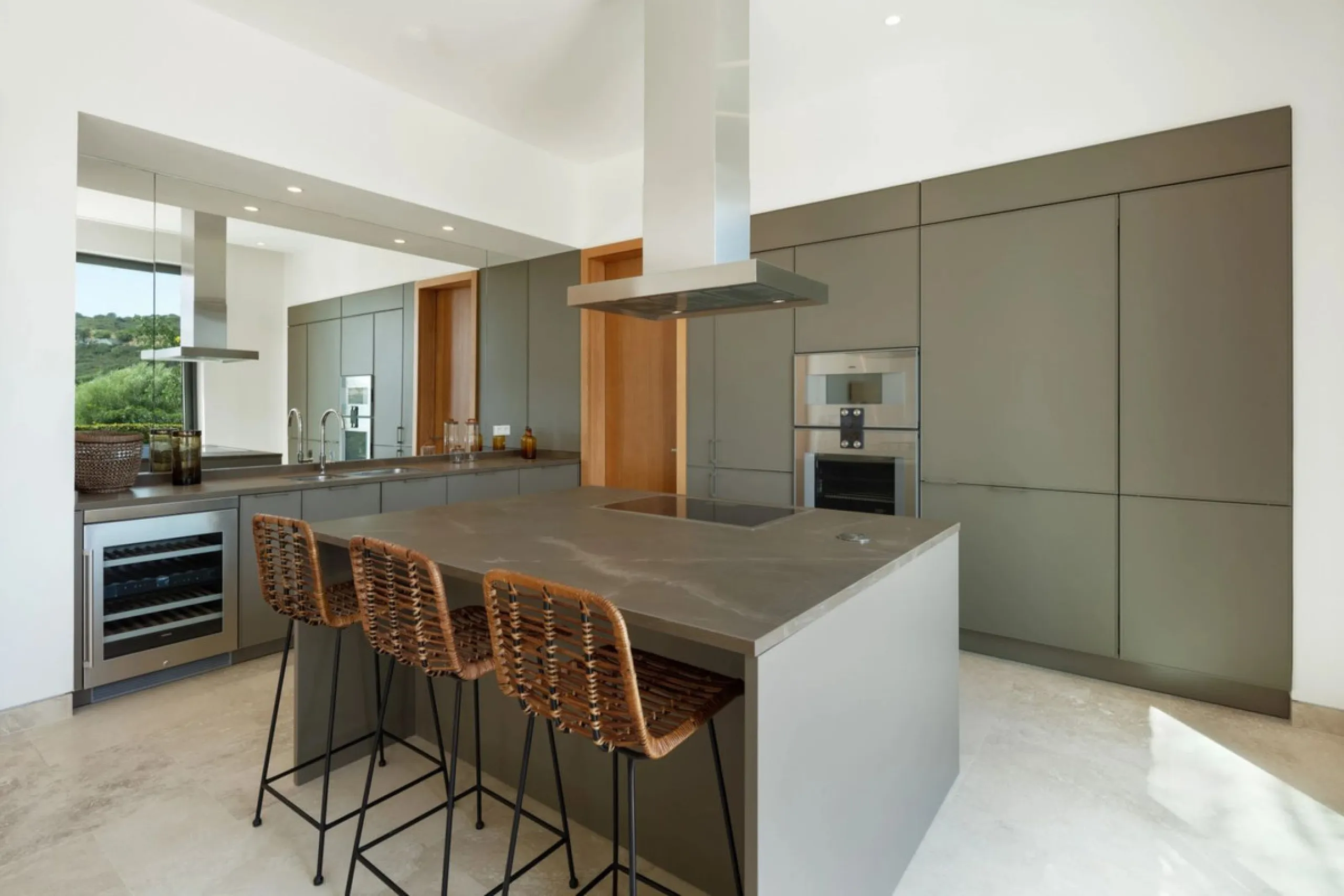 Situated in the exclusive Green 10 enclave within the prestigious Finca Cortesin Resort, this elegant villa offers a modern interpretation of luxury golfside living. Set across two levels, the home features a spacious open-plan living area with soaring ce