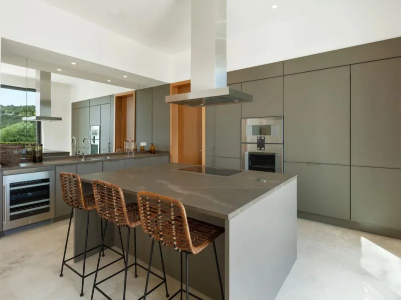 Situated in the exclusive Green 10 enclave within the prestigious Finca Cortesin Resort, this elegant villa offers a modern interpretation of luxury golfside living. Set across two levels, the home features a spacious open-plan living area with soaring ce