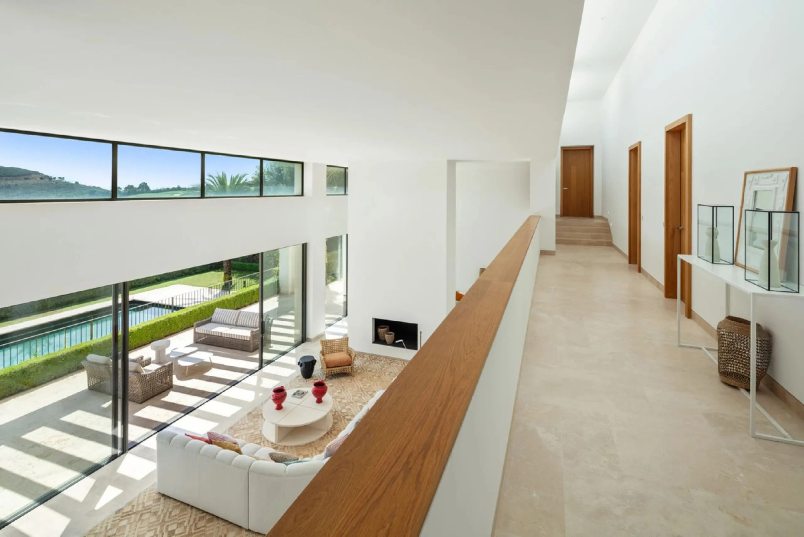 Situated in the exclusive Green 10 enclave within the prestigious Finca Cortesin Resort, this elegant villa offers a modern interpretation of luxury golfside living. Set across two levels, the home features a spacious open-plan living area with soaring ce