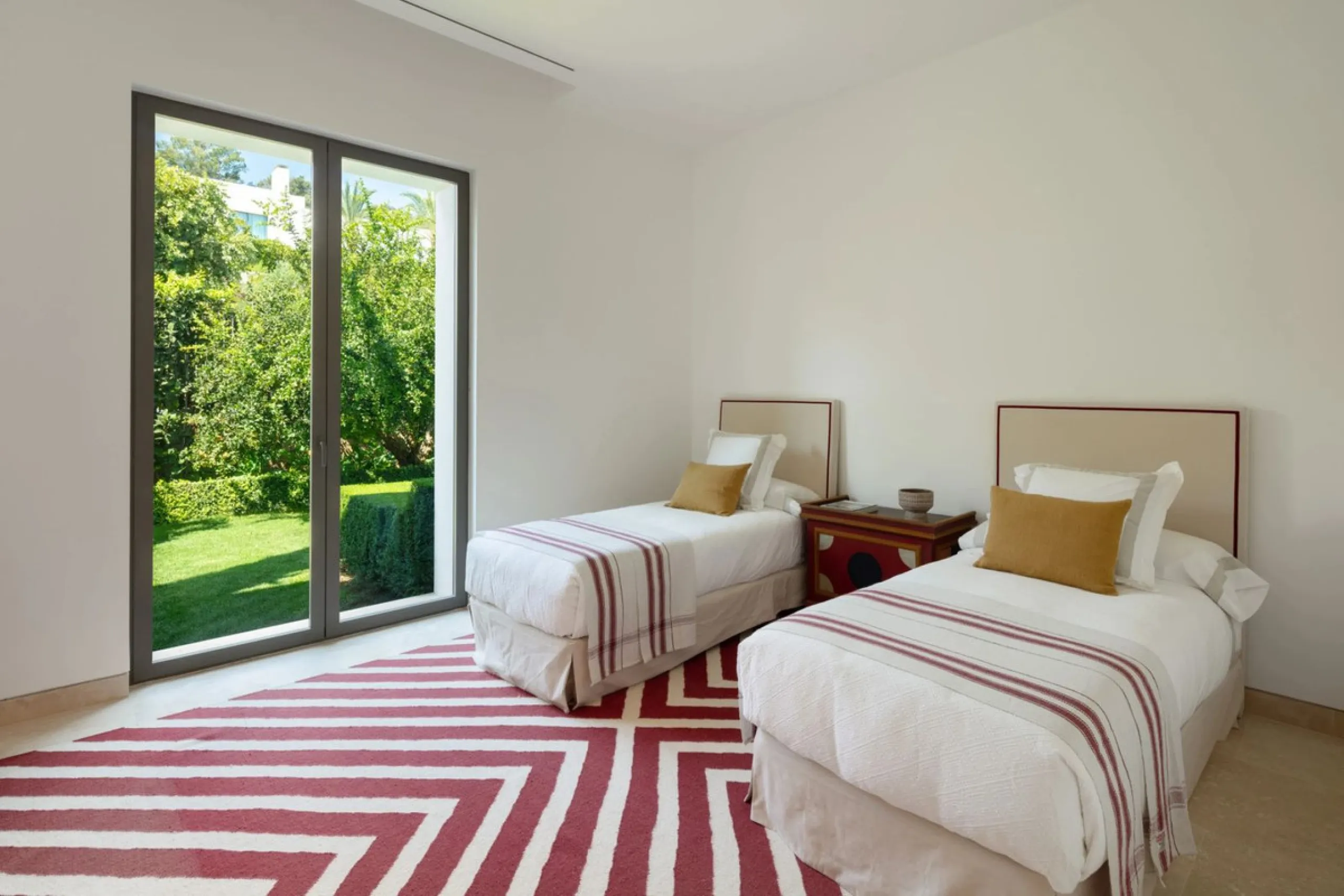 Situated in the exclusive Green 10 enclave within the prestigious Finca Cortesin Resort, this elegant villa offers a modern interpretation of luxury golfside living. Set across two levels, the home features a spacious open-plan living area with soaring ce