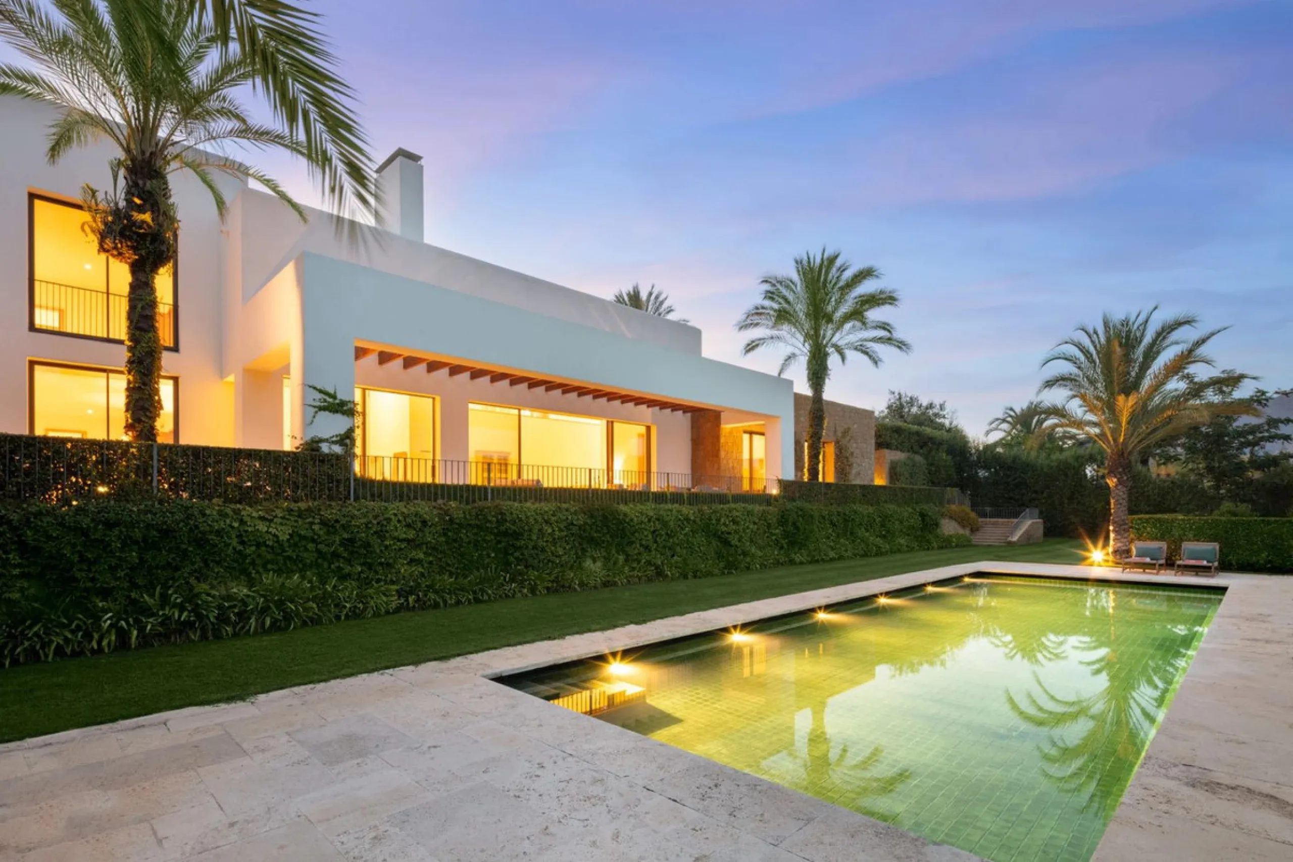 Situated in the exclusive Green 10 enclave within the prestigious Finca Cortesin Resort, this elegant villa offers a modern interpretation of luxury golfside living. Set across two levels, the home features a spacious open-plan living area with soaring ce