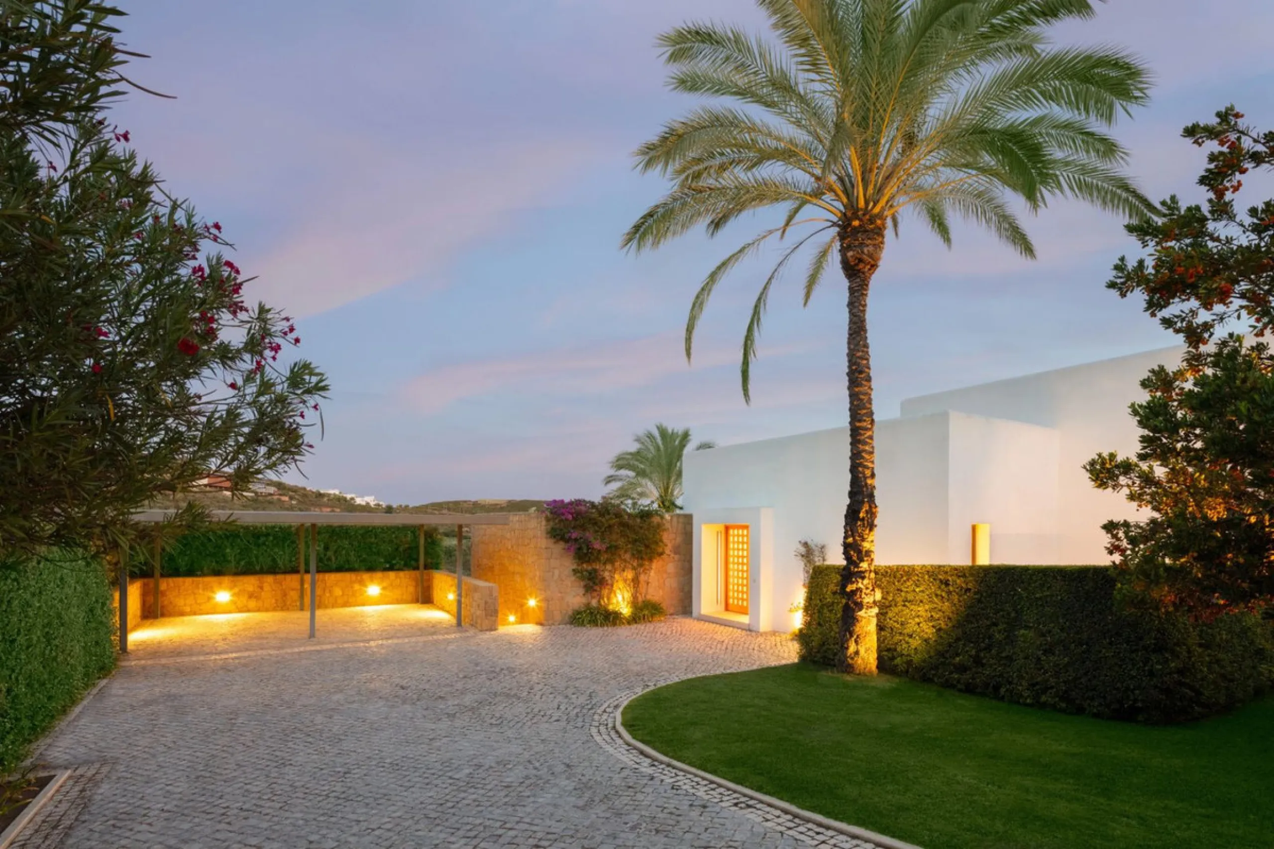 Situated in the exclusive Green 10 enclave within the prestigious Finca Cortesin Resort, this elegant villa offers a modern interpretation of luxury golfside living. Set across two levels, the home features a spacious open-plan living area with soaring ce