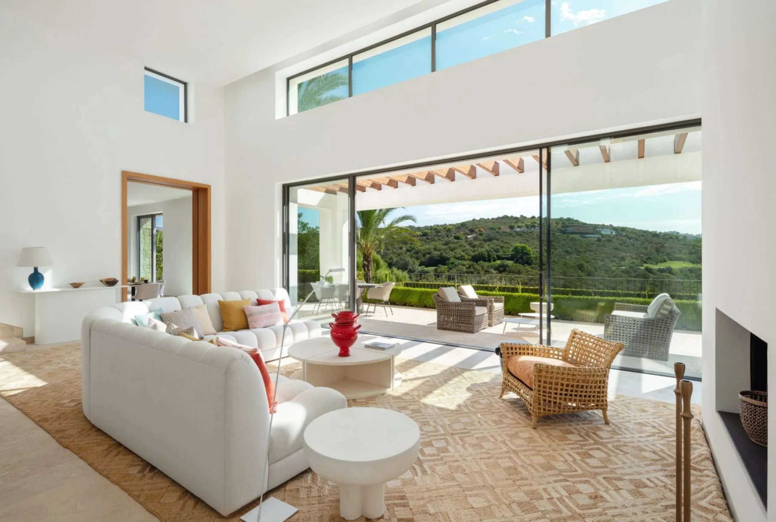 Situated in the exclusive Green 10 enclave within the prestigious Finca Cortesin Resort, this elegant villa offers a modern interpretation of luxury golfside living. Set across two levels, the home features a spacious open-plan living area with soaring ce