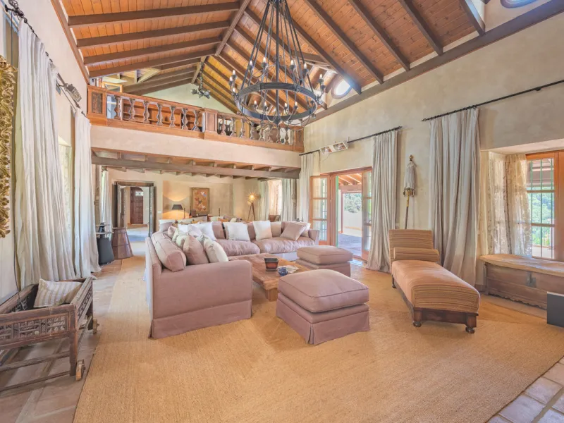 Lovely ten bedroom, south facing country style villa in El Velerin, Estepona, with a large private garden and swimming pool. The property has a large entrance hall; cosy living area with a fireplace and high ceilings; dining room; fully fitted kitchen wit