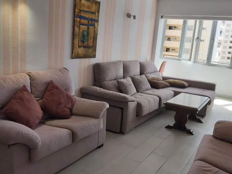 For sale: a bright top-floor apartment located in a quiet, well-connected building. The property features 2 bedrooms, 1 full bathroom, a spacious living room, and an independent kitchen.