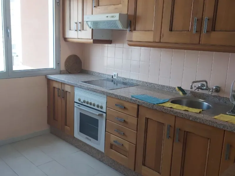 For sale: a bright top-floor apartment located in a quiet, well-connected building. The property features 2 bedrooms, 1 full bathroom, a spacious living room, and an independent kitchen.