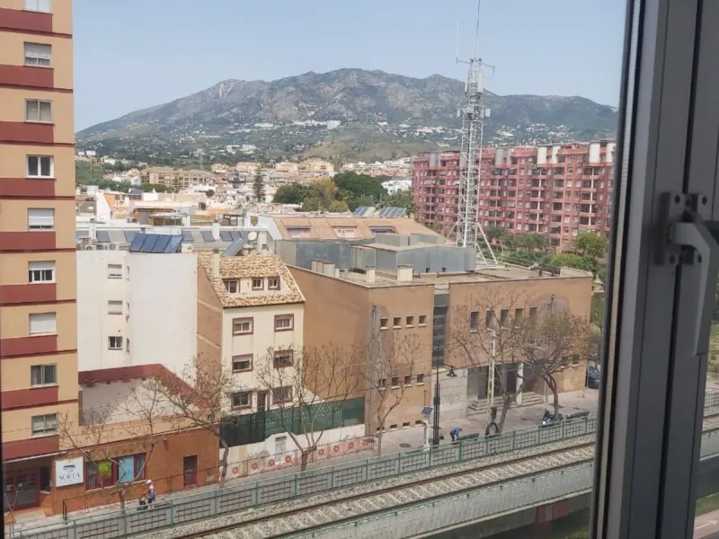 For sale: a bright top-floor apartment located in a quiet, well-connected building. The property features 2 bedrooms, 1 full bathroom, a spacious living room, and an independent kitchen.