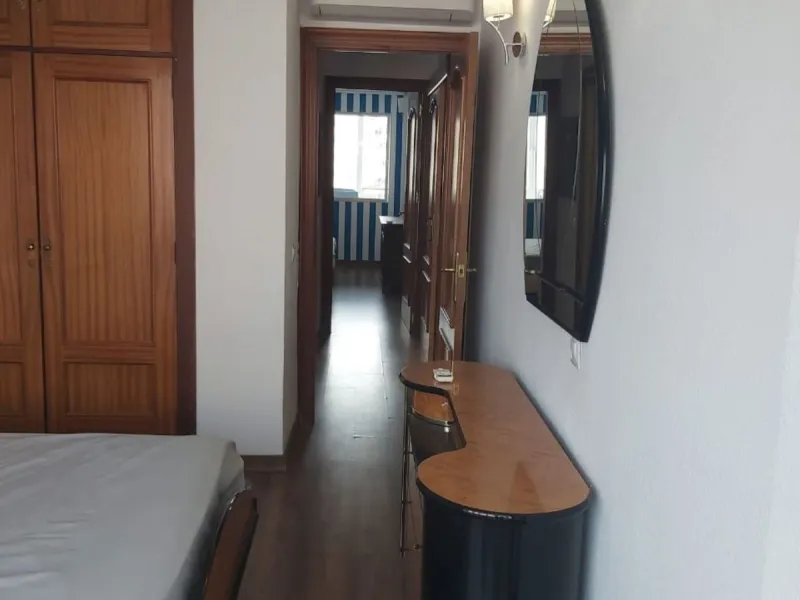 For sale: a bright top-floor apartment located in a quiet, well-connected building. The property features 2 bedrooms, 1 full bathroom, a spacious living room, and an independent kitchen.