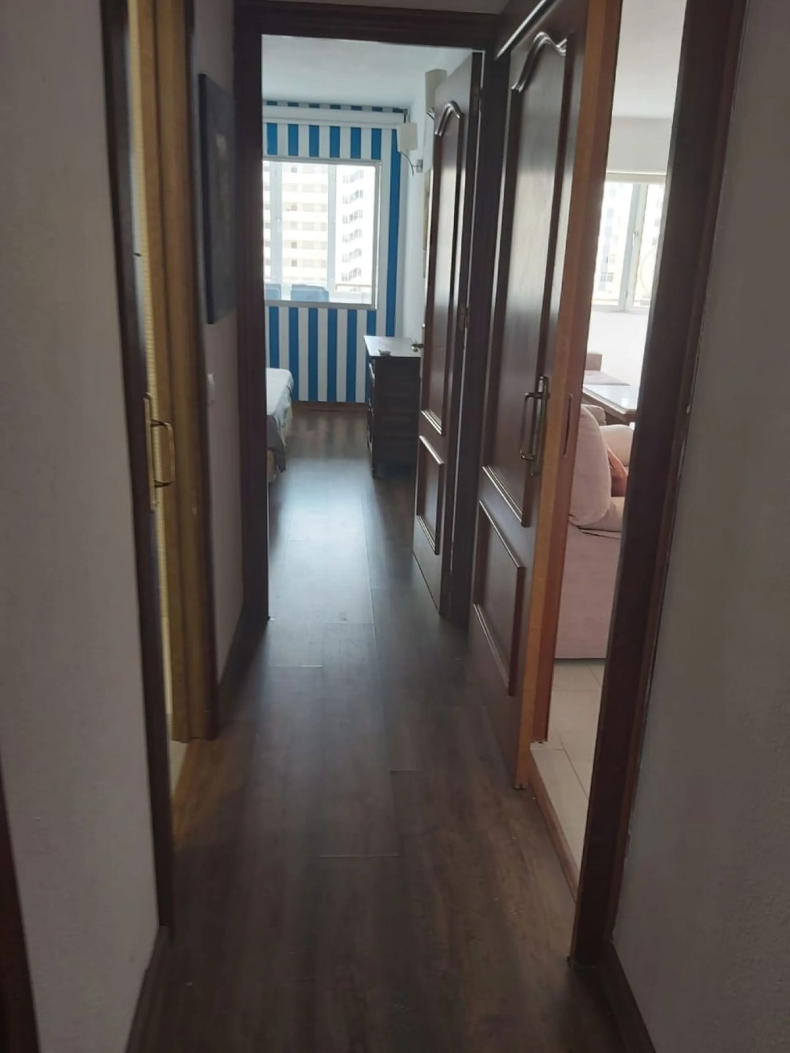 For sale: a bright top-floor apartment located in a quiet, well-connected building. The property features 2 bedrooms, 1 full bathroom, a spacious living room, and an independent kitchen.