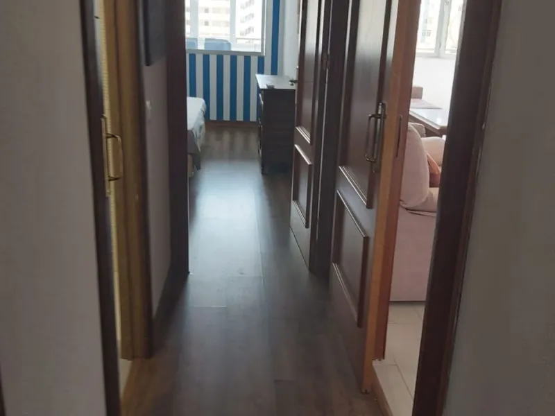 For sale: a bright top-floor apartment located in a quiet, well-connected building. The property features 2 bedrooms, 1 full bathroom, a spacious living room, and an independent kitchen.