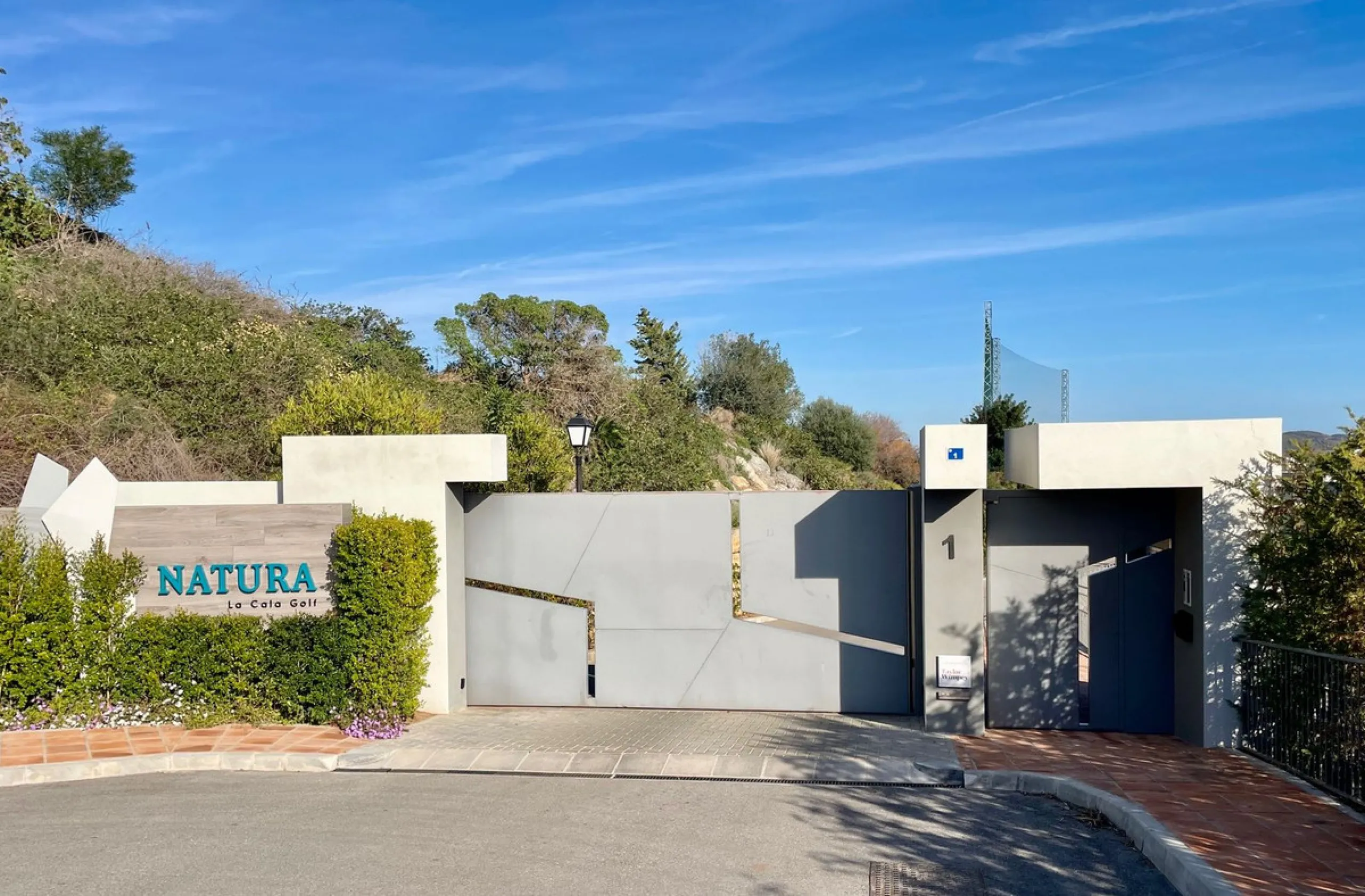 Rare opportunity: Luxurious townhouse with modern glass lift in La Cala Golf Resort.