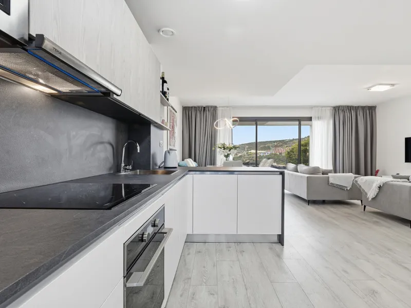 This stylish three bedroom townhouse is set within the popular Golden View I development, an elevated residential community known for its open sea views that stretch all the way to Gibraltar and the coast of Morocco. Thanks to its southwest facing orienta