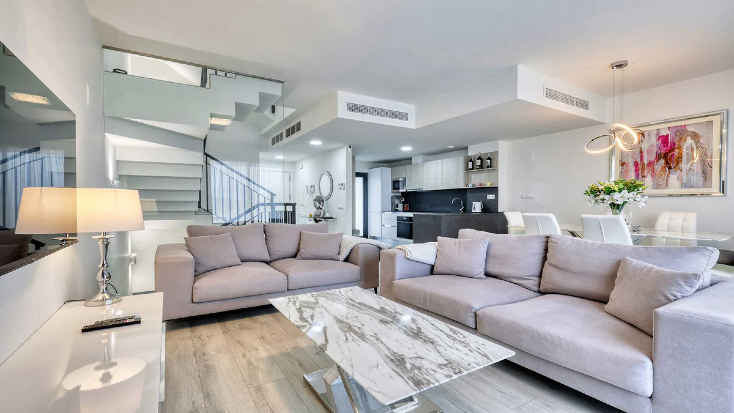 This stylish three bedroom townhouse is set within the popular Golden View I development, an elevated residential community known for its open sea views that stretch all the way to Gibraltar and the coast of Morocco. Thanks to its southwest facing orienta