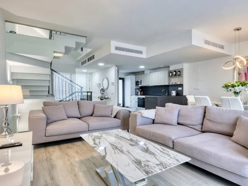This stylish three bedroom townhouse is set within the popular Golden View I development, an elevated residential community known for its open sea views that stretch all the way to Gibraltar and the coast of Morocco. Thanks to its southwest facing orienta