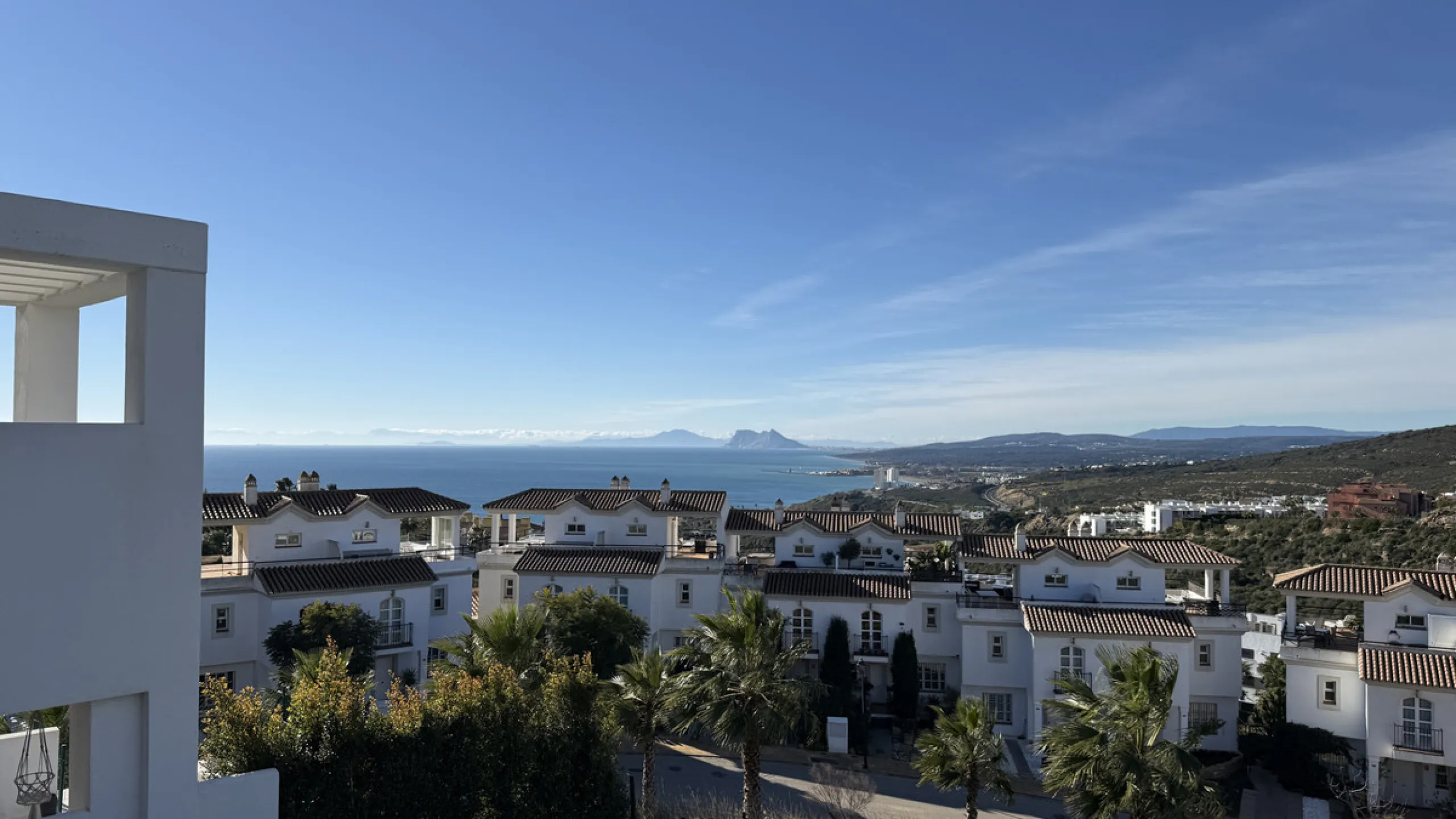 This stylish three bedroom townhouse is set within the popular Golden View I development, an elevated residential community known for its open sea views that stretch all the way to Gibraltar and the coast of Morocco. Thanks to its southwest facing orienta