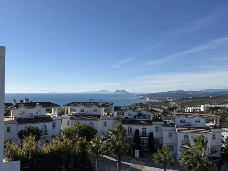 This stylish three bedroom townhouse is set within the popular Golden View I development, an elevated residential community known for its open sea views that stretch all the way to Gibraltar and the coast of Morocco. Thanks to its southwest facing orienta