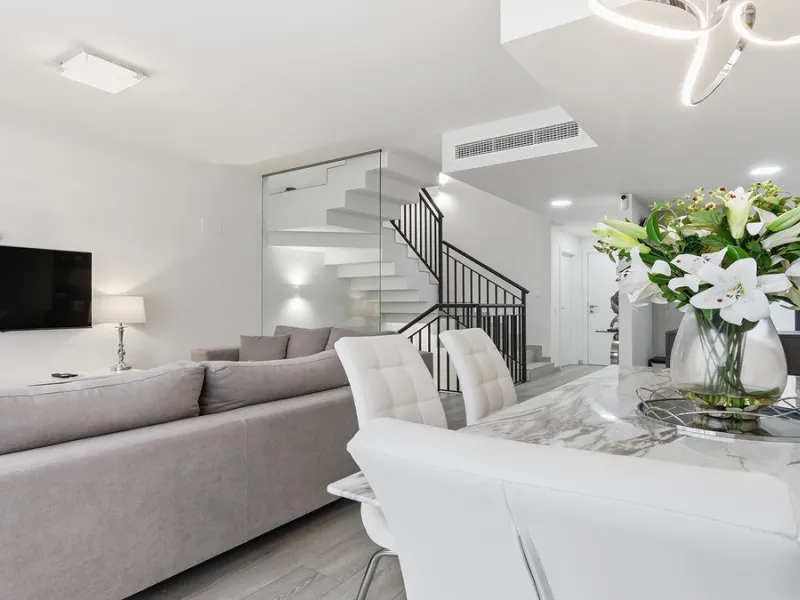 This stylish three bedroom townhouse is set within the popular Golden View I development, an elevated residential community known for its open sea views that stretch all the way to Gibraltar and the coast of Morocco. Thanks to its southwest facing orienta