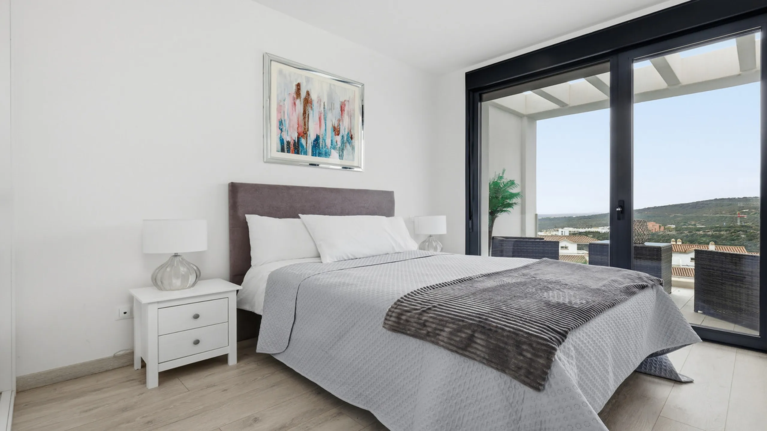 This stylish three bedroom townhouse is set within the popular Golden View I development, an elevated residential community known for its open sea views that stretch all the way to Gibraltar and the coast of Morocco. Thanks to its southwest facing orienta