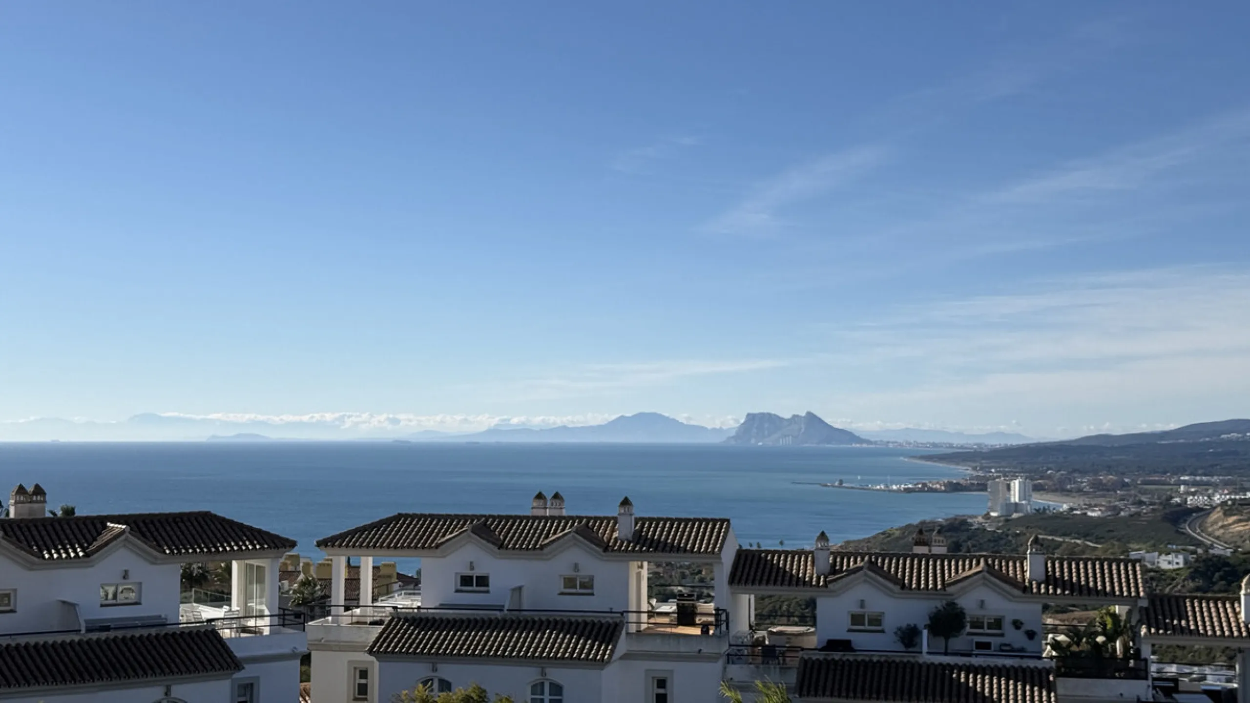 This stylish three bedroom townhouse is set within the popular Golden View I development, an elevated residential community known for its open sea views that stretch all the way to Gibraltar and the coast of Morocco. Thanks to its southwest facing orienta