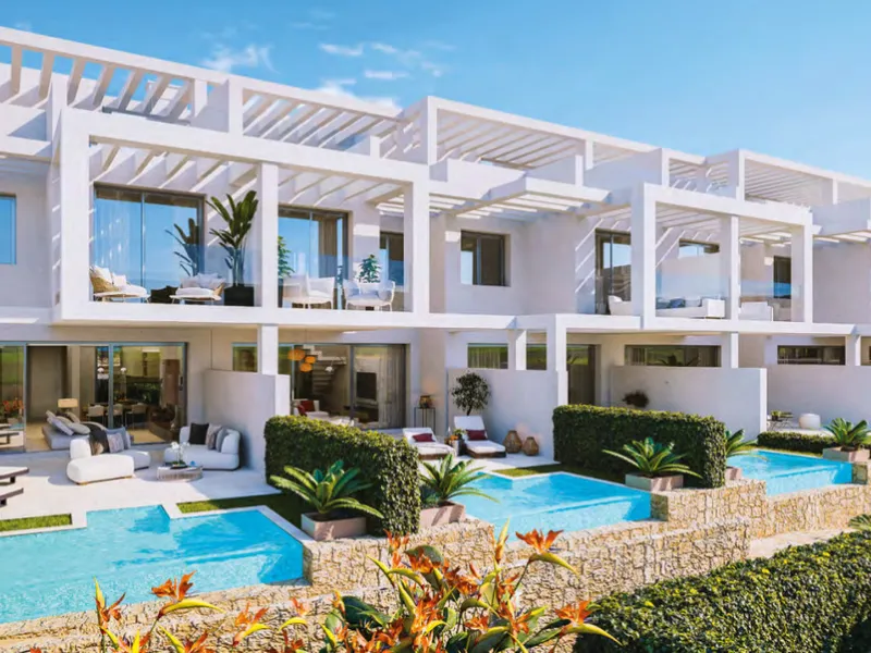 This stylish three bedroom townhouse is set within the popular Golden View I development, an elevated residential community known for its open sea views that stretch all the way to Gibraltar and the coast of Morocco. Thanks to its southwest facing orienta