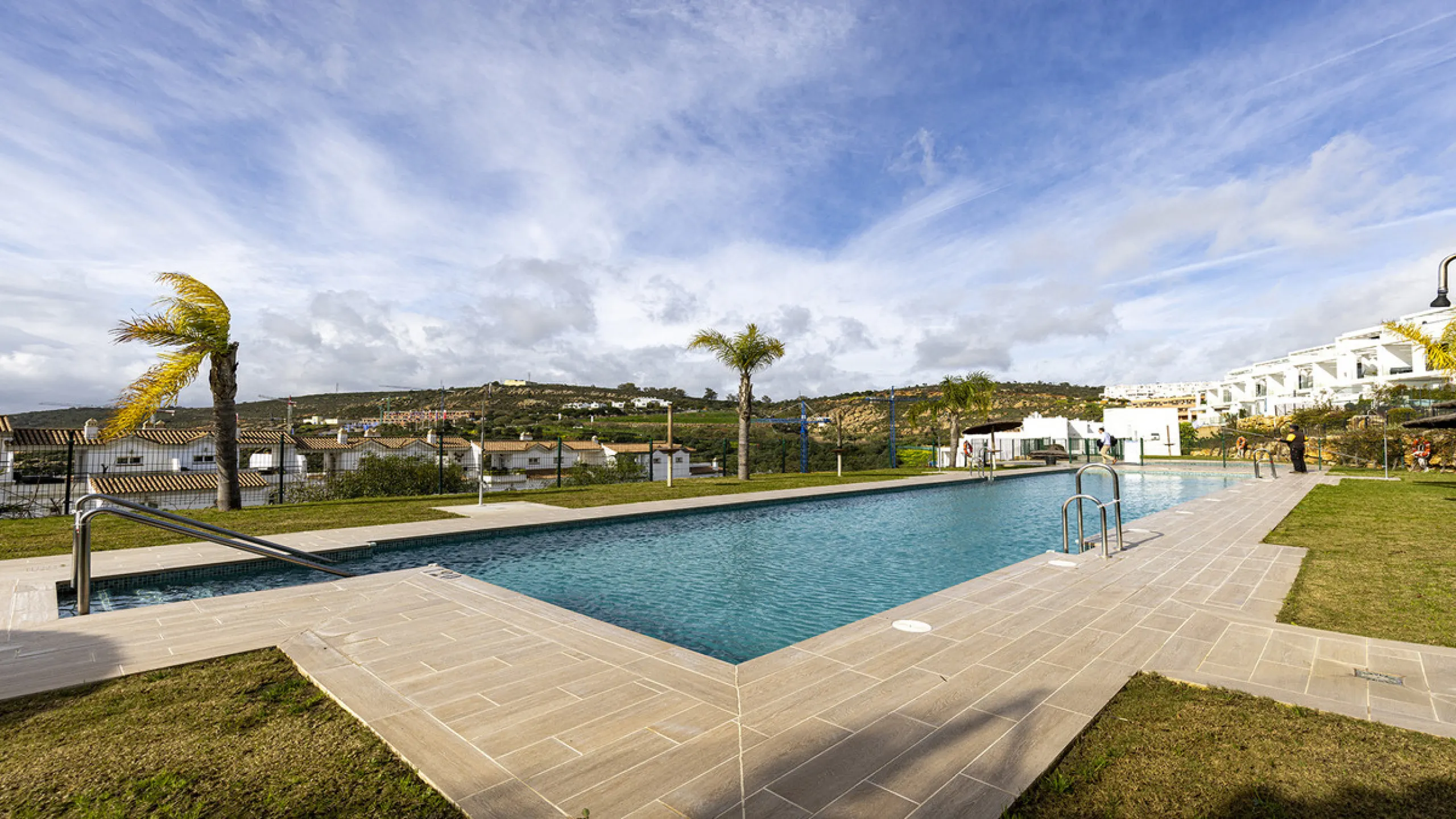This stylish three bedroom townhouse is set within the popular Golden View I development, an elevated residential community known for its open sea views that stretch all the way to Gibraltar and the coast of Morocco. Thanks to its southwest facing orienta