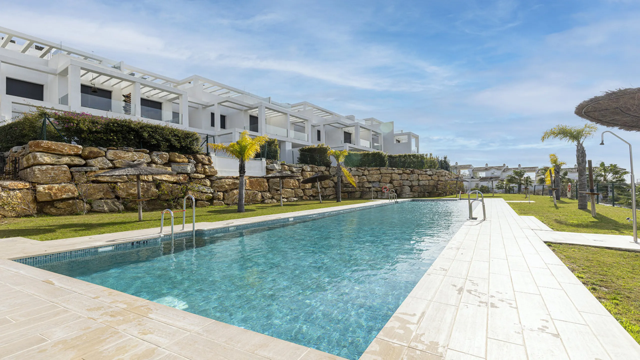 This stylish three bedroom townhouse is set within the popular Golden View I development, an elevated residential community known for its open sea views that stretch all the way to Gibraltar and the coast of Morocco. Thanks to its southwest facing orienta