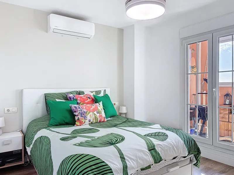 This beautifully presented 100 m2 apartment in Torre de Benagalbón enjoys a sought-after south-west orientation and truly impressive sea views, filling the home with natural light and unforgettable sunsets. The spacious living area opens directly onto a g
