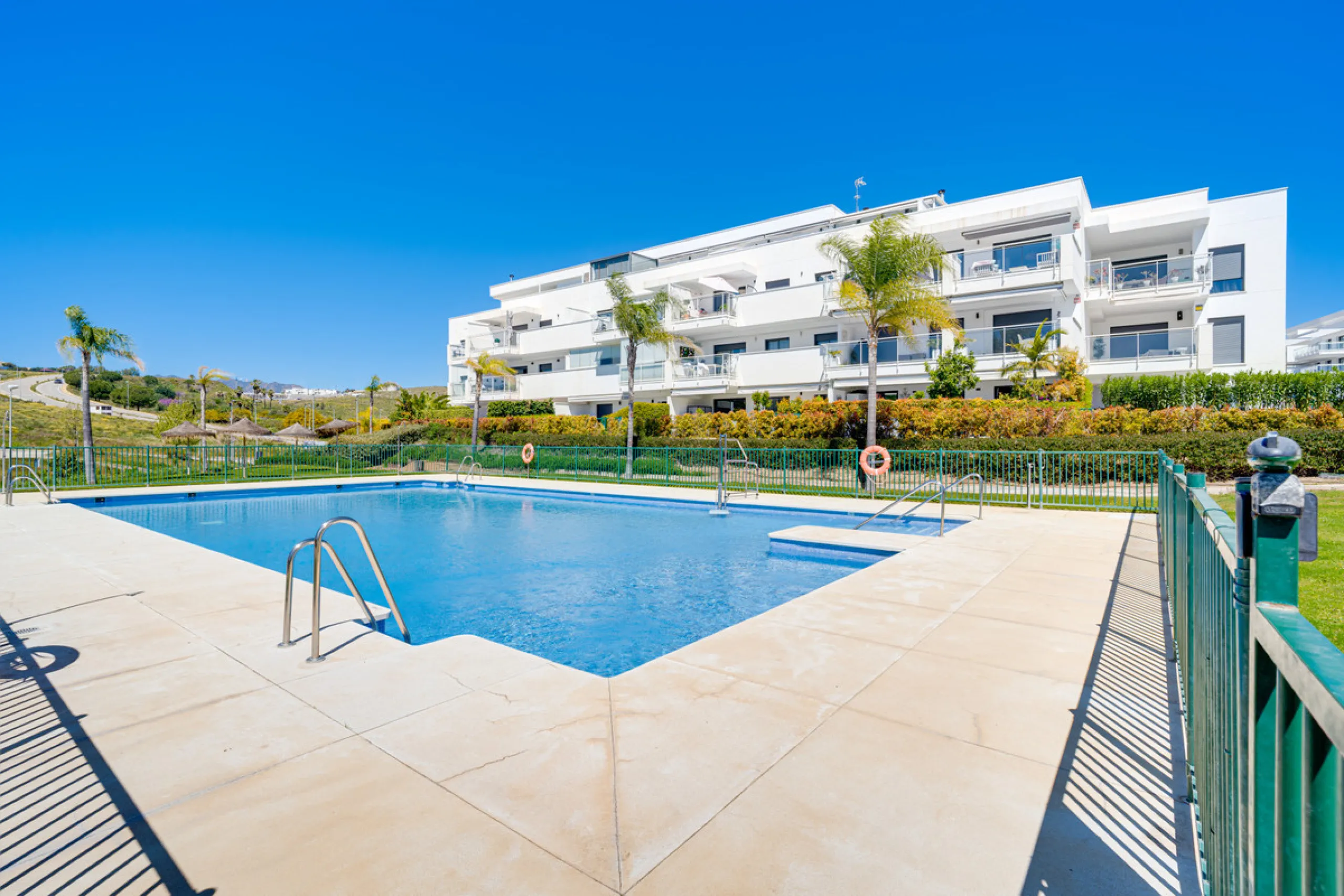 This bright and spacious two-bedroom ground floor apartment is ideally located within the sought-after gated community of El Lagar in La Cala de Mijas. Both bedrooms enjoy direct access to a generous terrace and private garden, offering plenty of natural 
