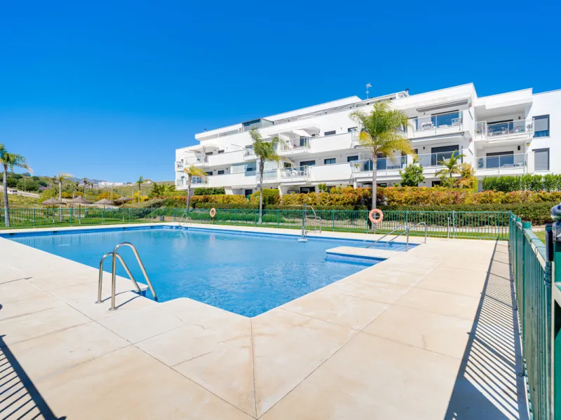 This bright and spacious two-bedroom ground floor apartment is ideally located within the sought-after gated community of El Lagar in La Cala de Mijas. Both bedrooms enjoy direct access to a generous terrace and private garden, offering plenty of natural 