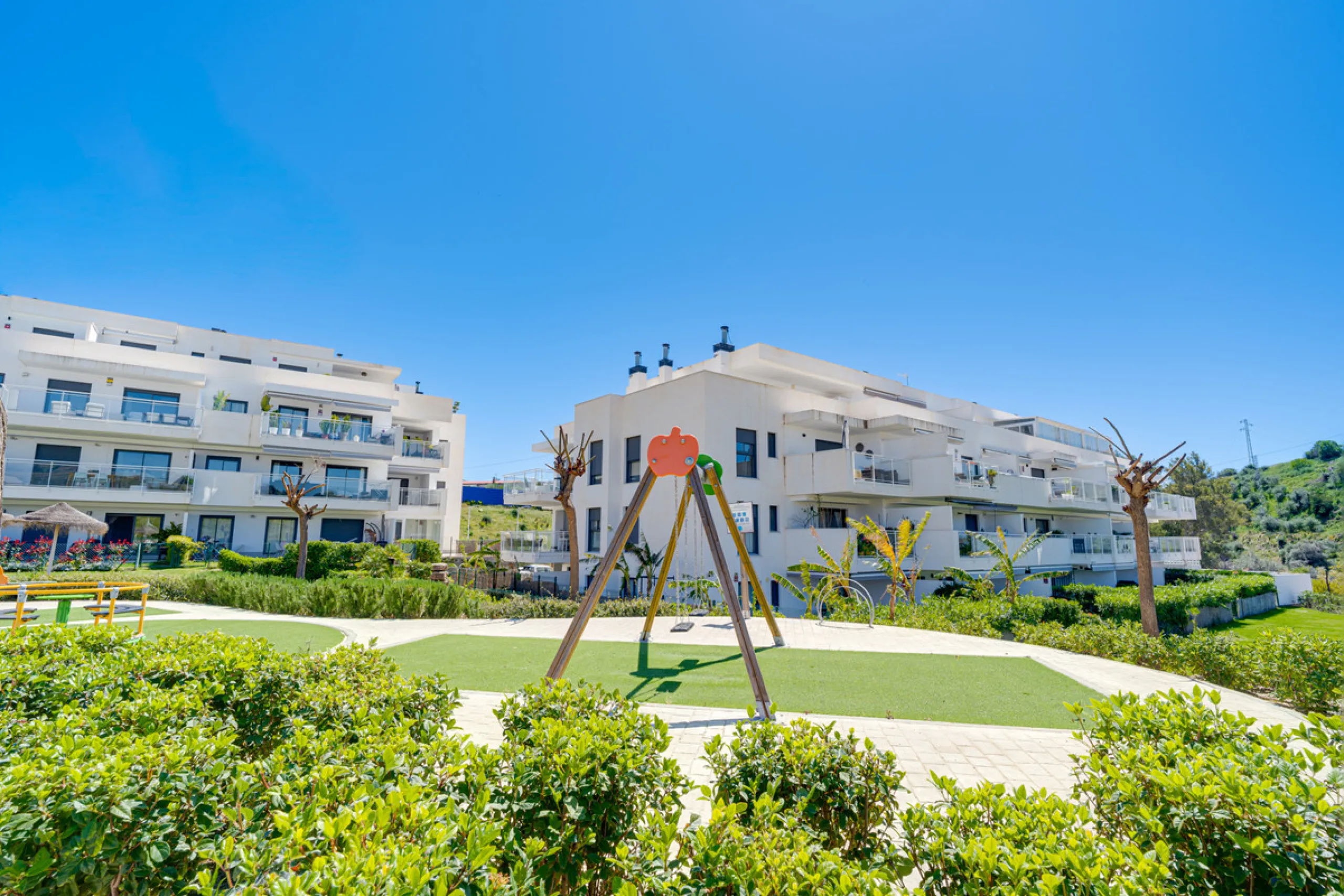 This bright and spacious two-bedroom ground floor apartment is ideally located within the sought-after gated community of El Lagar in La Cala de Mijas. Both bedrooms enjoy direct access to a generous terrace and private garden, offering plenty of natural 