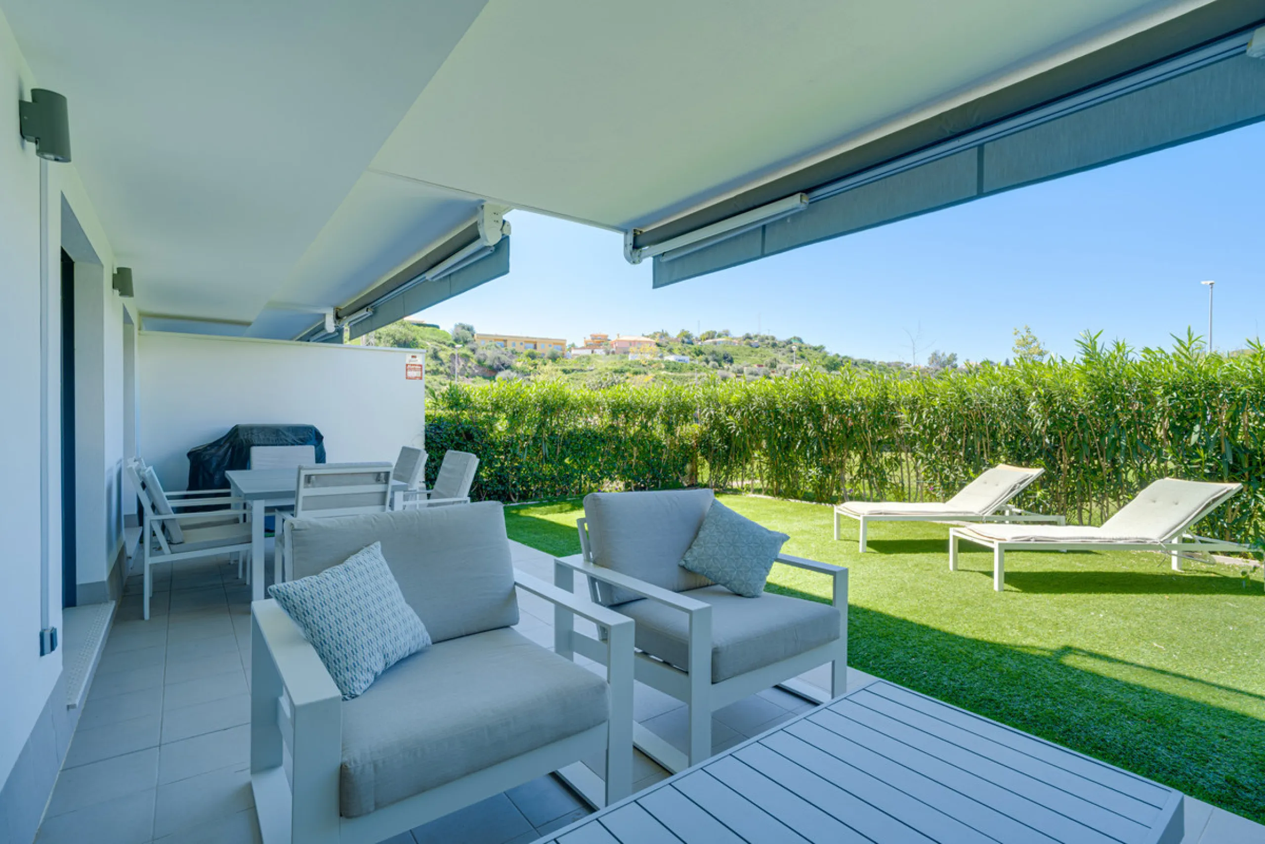 This bright and spacious two-bedroom ground floor apartment is ideally located within the sought-after gated community of El Lagar in La Cala de Mijas. Both bedrooms enjoy direct access to a generous terrace and private garden, offering plenty of natural 
