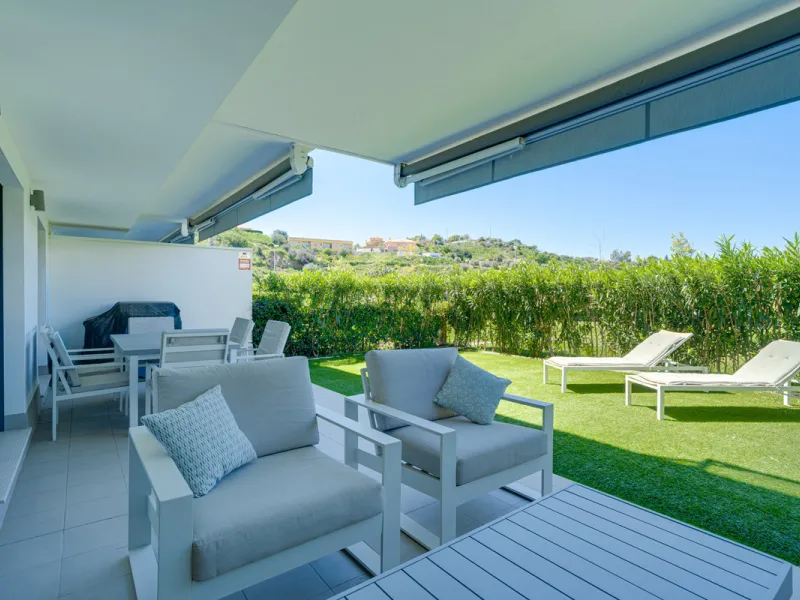 This bright and spacious two-bedroom ground floor apartment is ideally located within the sought-after gated community of El Lagar in La Cala de Mijas. Both bedrooms enjoy direct access to a generous terrace and private garden, offering plenty of natural 
