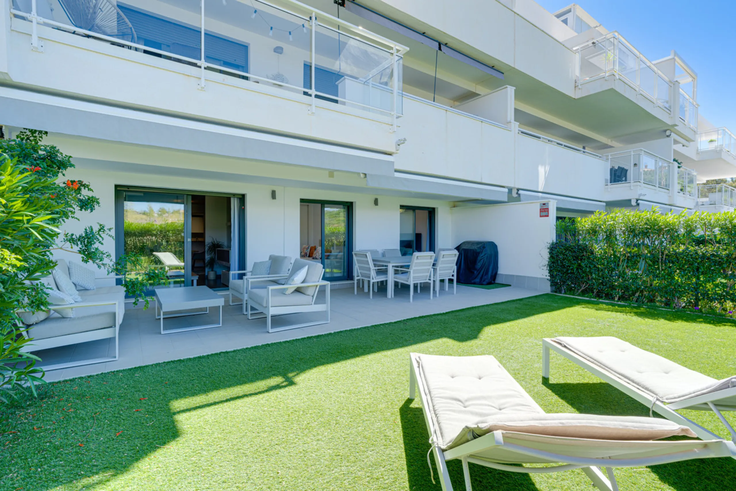 This bright and spacious two-bedroom ground floor apartment is ideally located within the sought-after gated community of El Lagar in La Cala de Mijas. Both bedrooms enjoy direct access to a generous terrace and private garden, offering plenty of natural 
