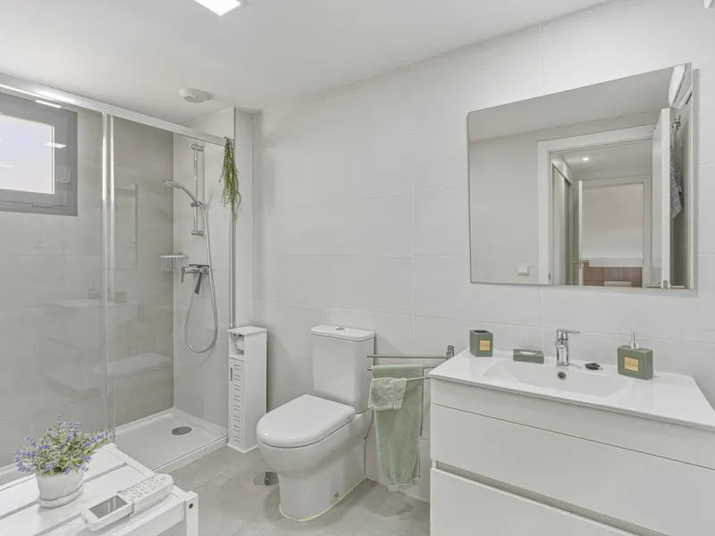 This bright and spacious two-bedroom ground floor apartment is ideally located within the sought-after gated community of El Lagar in La Cala de Mijas. Both bedrooms enjoy direct access to a generous terrace and private garden, offering plenty of natural 