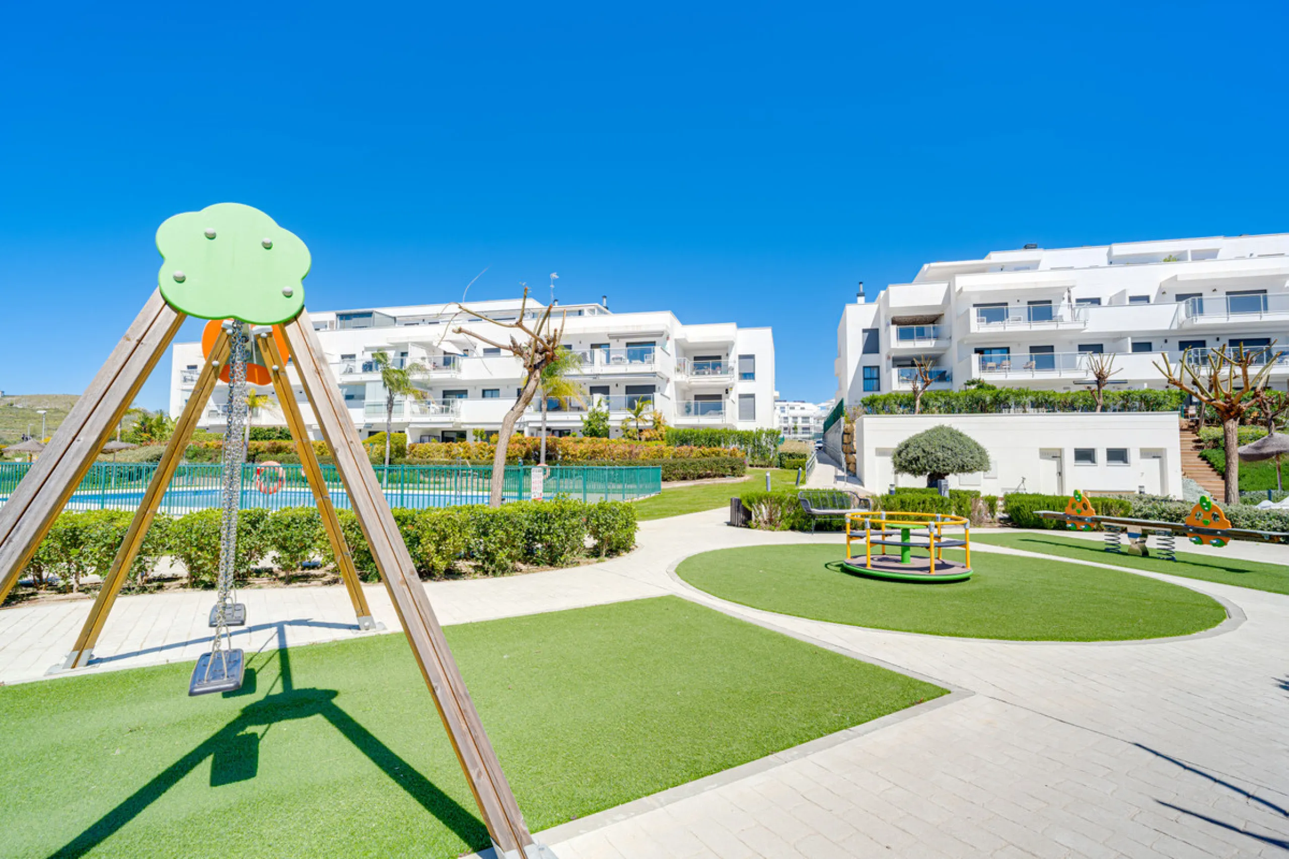 This bright and spacious two-bedroom ground floor apartment is ideally located within the sought-after gated community of El Lagar in La Cala de Mijas. Both bedrooms enjoy direct access to a generous terrace and private garden, offering plenty of natural 
