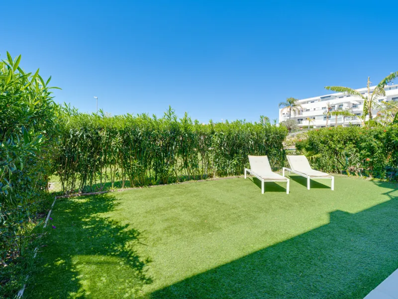 This bright and spacious two-bedroom ground floor apartment is ideally located within the sought-after gated community of El Lagar in La Cala de Mijas. Both bedrooms enjoy direct access to a generous terrace and private garden, offering plenty of natural 