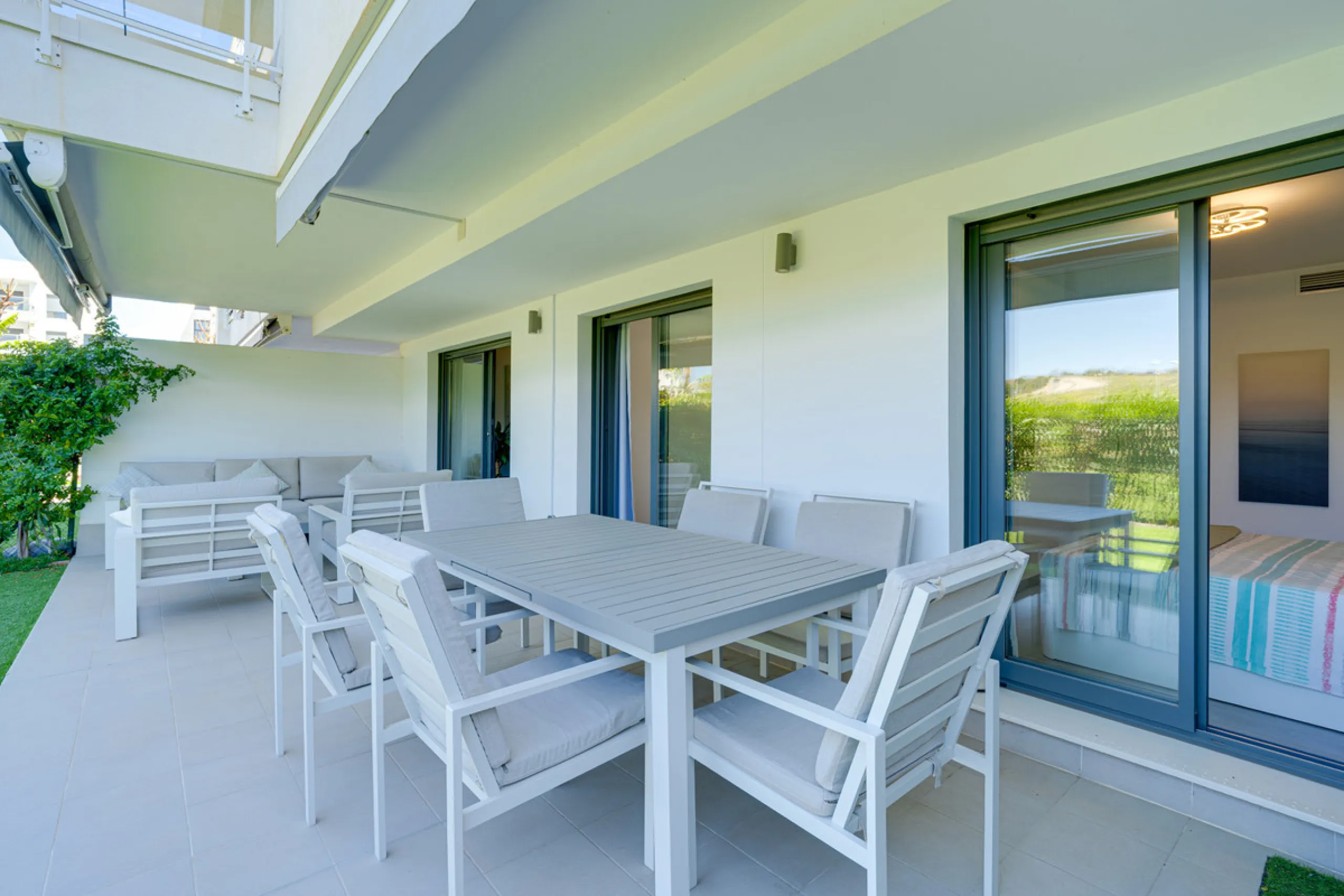 This bright and spacious two-bedroom ground floor apartment is ideally located within the sought-after gated community of El Lagar in La Cala de Mijas. Both bedrooms enjoy direct access to a generous terrace and private garden, offering plenty of natural 