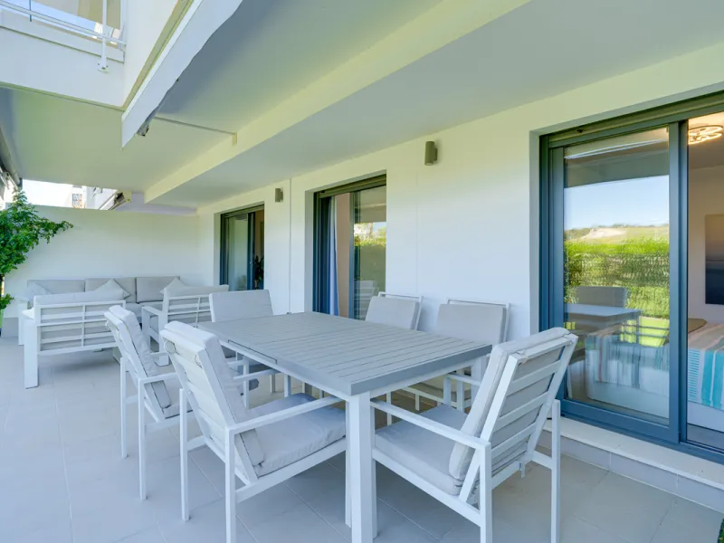 This bright and spacious two-bedroom ground floor apartment is ideally located within the sought-after gated community of El Lagar in La Cala de Mijas. Both bedrooms enjoy direct access to a generous terrace and private garden, offering plenty of natural 