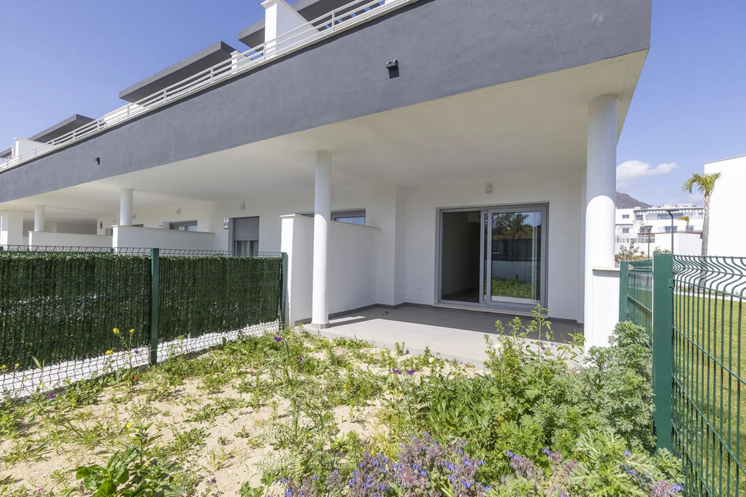 VALLE ROMANO BRAND NEW GARDEN APARTMENT - This recently handed over two bedroom garden apartment located in Habitat Valle Romano with private garden and terrace with master en-suite shower room, bedroom two, guest shower room, open plan living / dining an