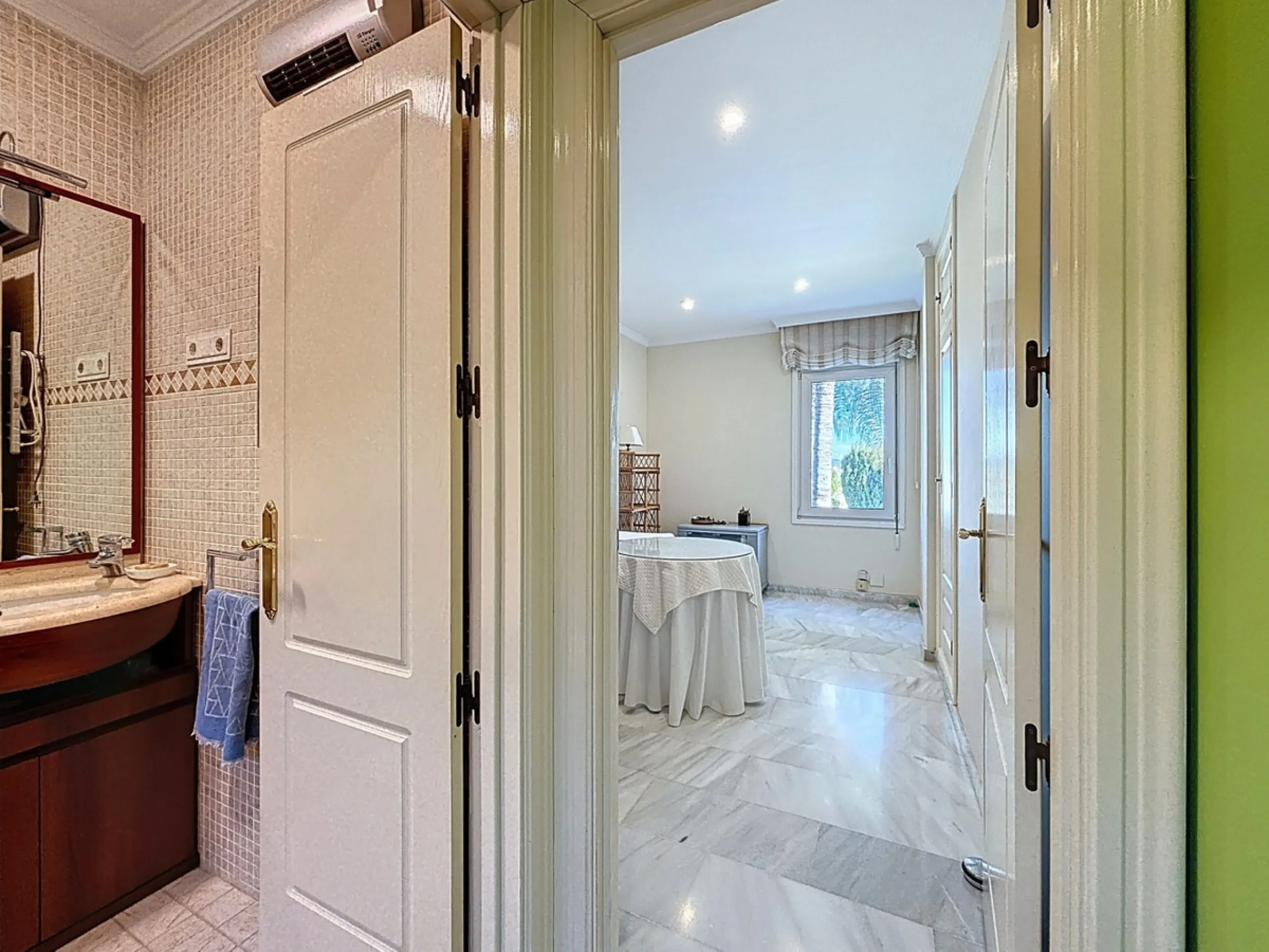 Discover your corner of paradise in this captivating three-bedroom, three-bathroom home, located in the sought-after El Capitan Urbanization. Distributed over two floors, this property perfectly combines modern comfort with the relaxed elegance of the Spa