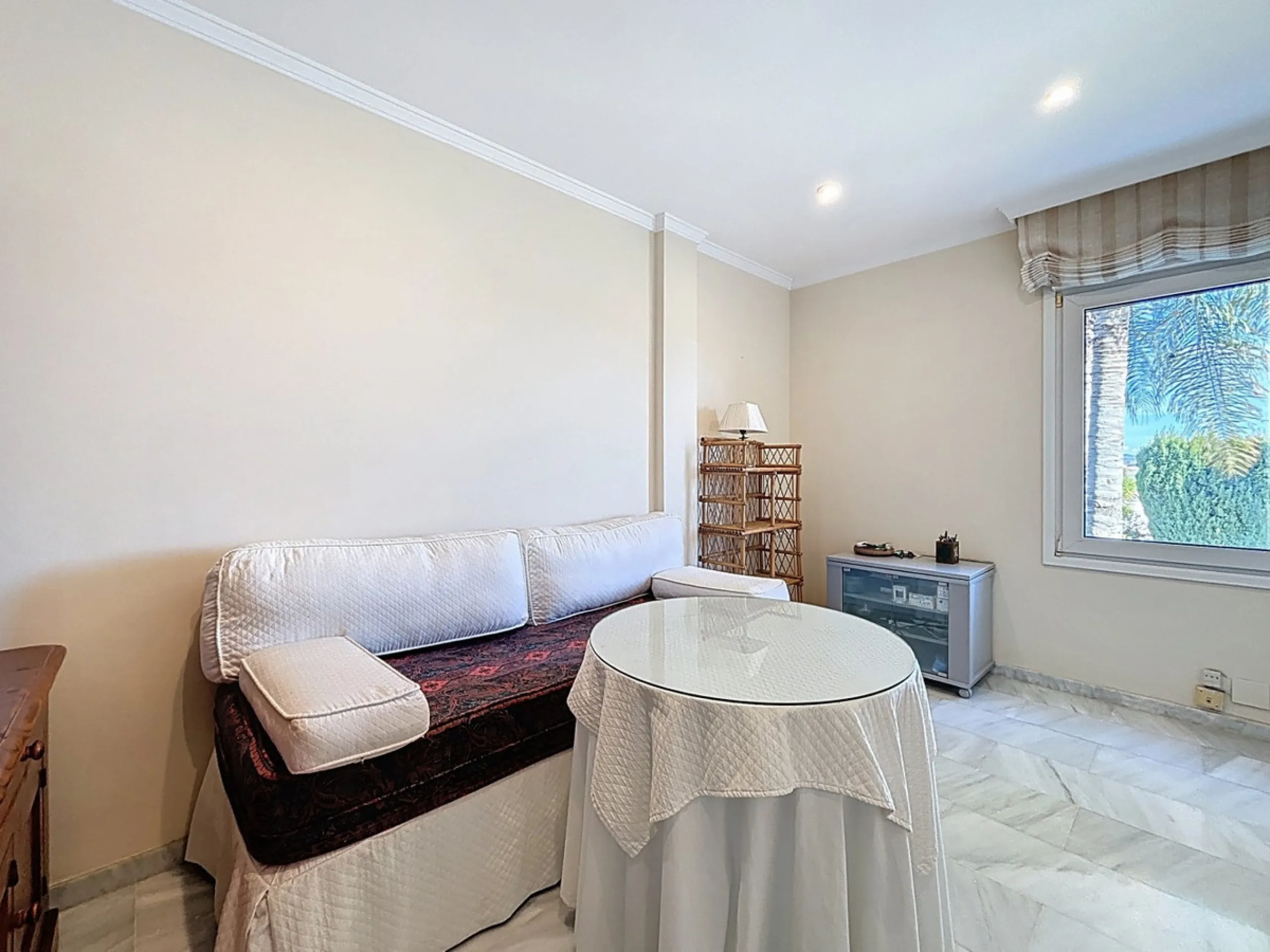 Discover your corner of paradise in this captivating three-bedroom, three-bathroom home, located in the sought-after El Capitan Urbanization. Distributed over two floors, this property perfectly combines modern comfort with the relaxed elegance of the Spa