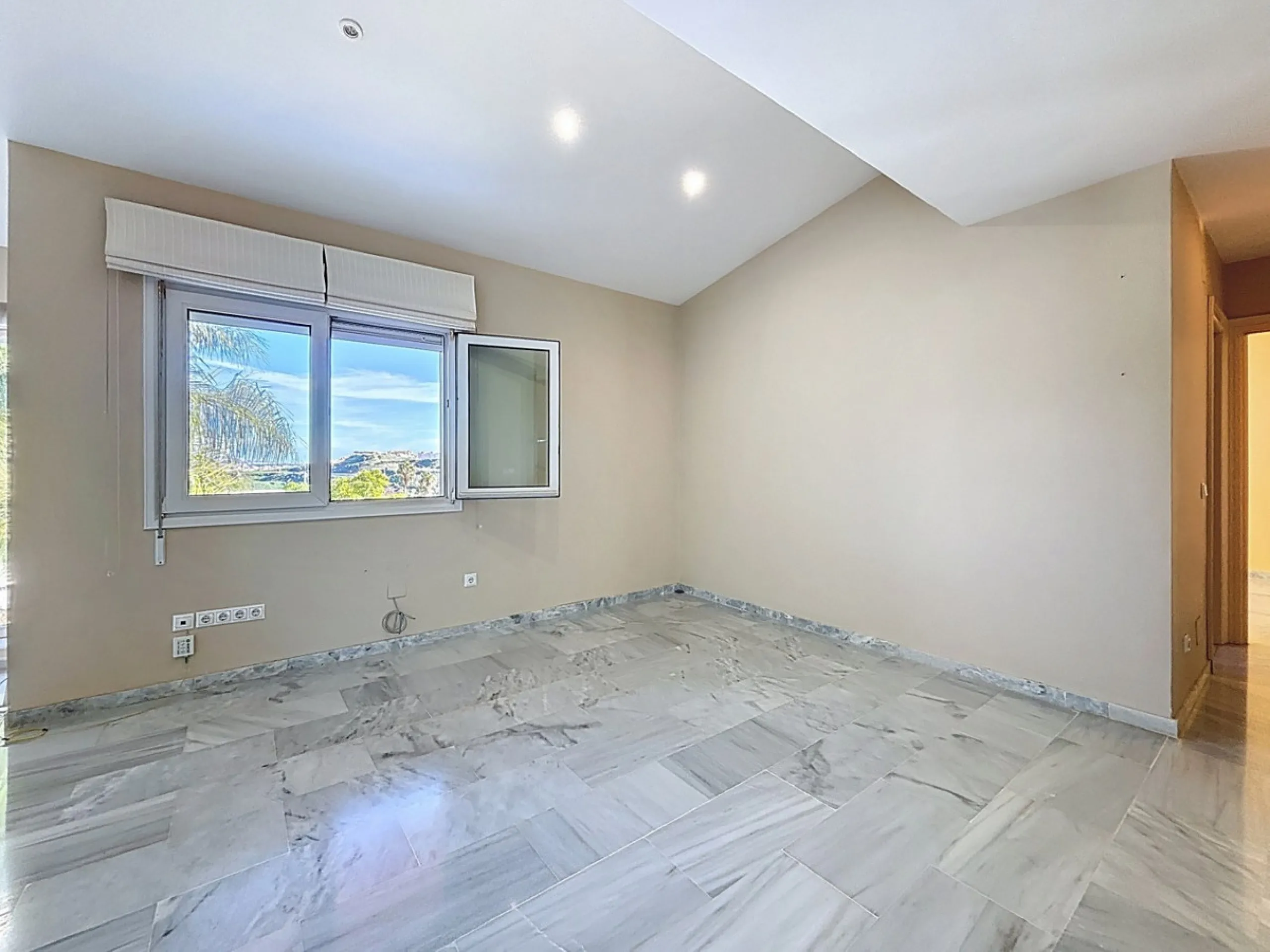 Discover your corner of paradise in this captivating three-bedroom, three-bathroom home, located in the sought-after El Capitan Urbanization. Distributed over two floors, this property perfectly combines modern comfort with the relaxed elegance of the Spa